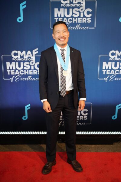 Jared Cassedy in front of step and repeat